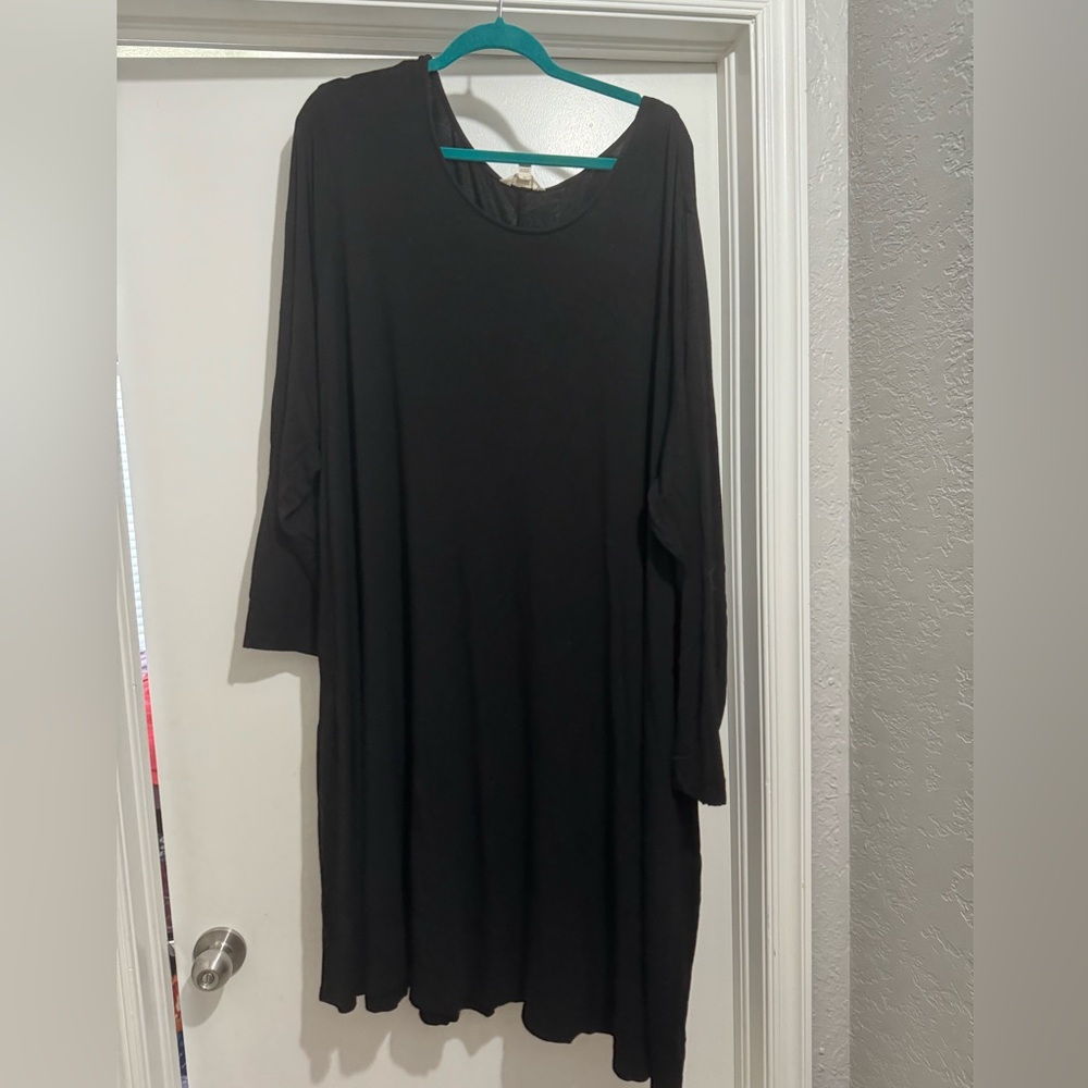Long sleeve black dress.